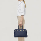 Borsa Helen L