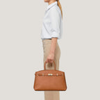 Borsa Helen L