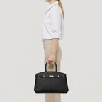 Borsa Helen L